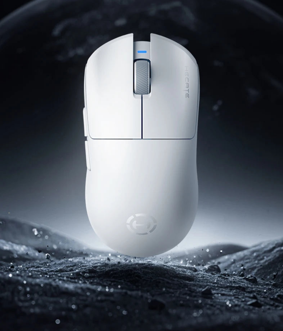 White gaming mouse on a dark, moon-like surface
