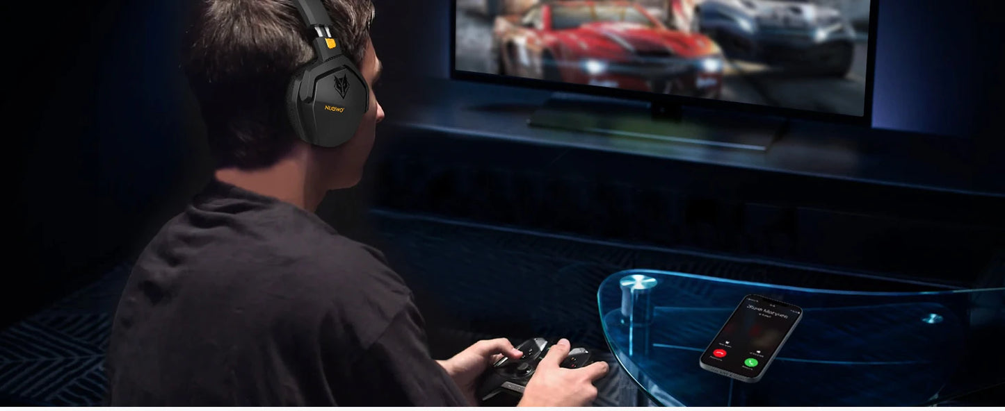 Person playing a racing game on a TV with gaming headset and controller.